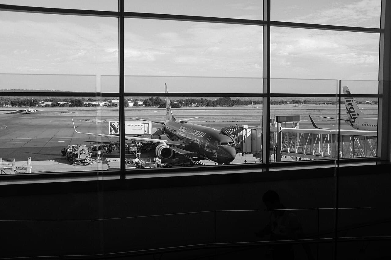 Passenger aircraft parked at an airport before departure